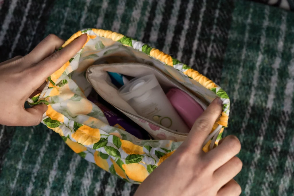 Looking into the DIY lemon patterned bag where toiletries are stored.